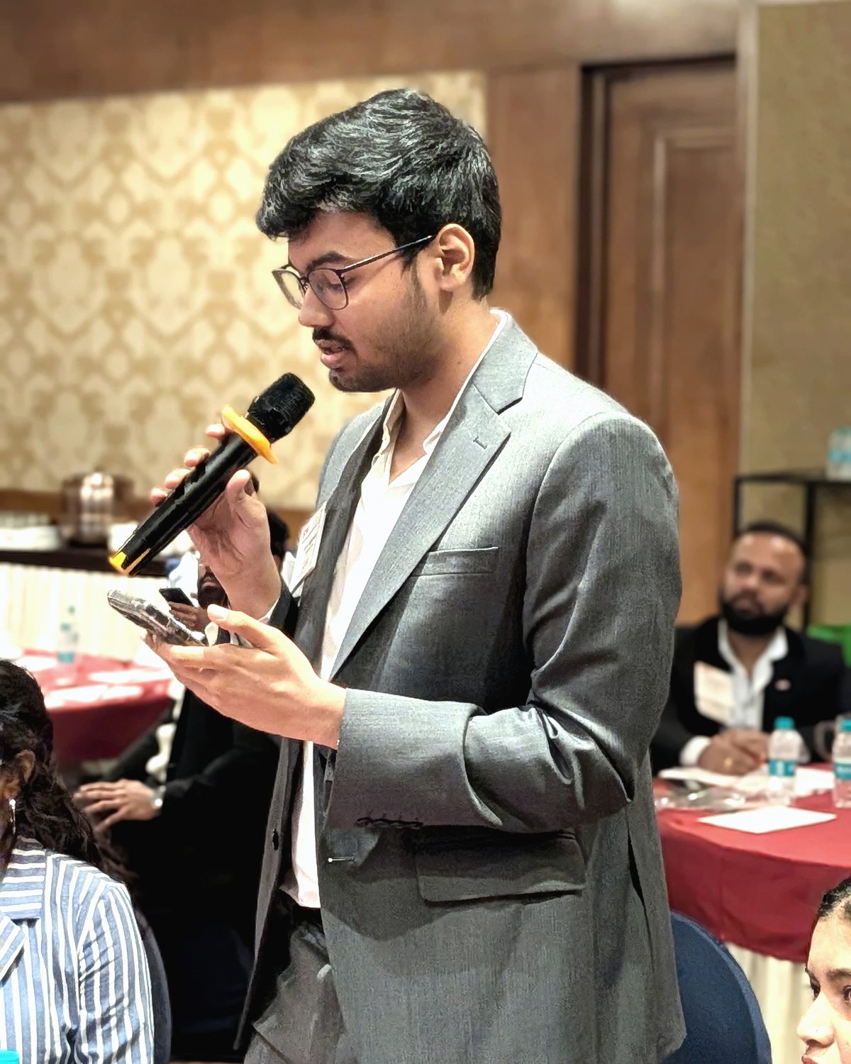 CA Sahil Agarwal speaking at an event